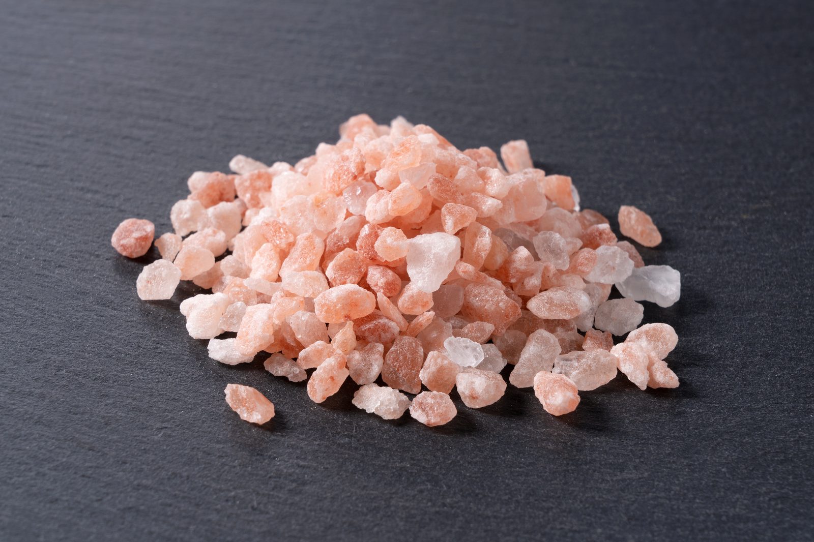 Coarse Himalayan pink salt on slate
